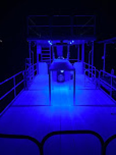 interior of a barge lit up during the night