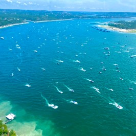 a group of people swimming in a body of water
