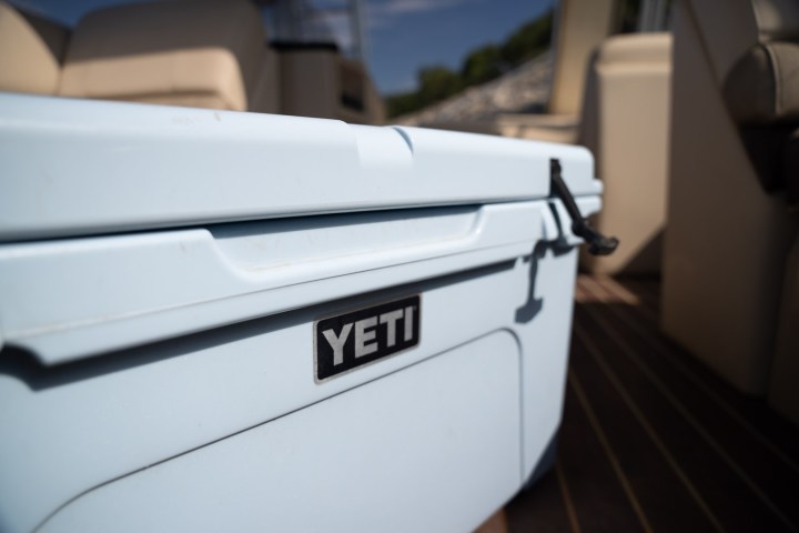 a stove top oven sitting inside of a car